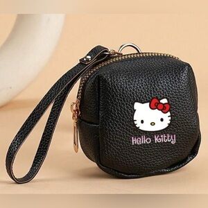 Black Hello Kitty Mini Bag Coin Purse Wristlet with Zipper Closure.